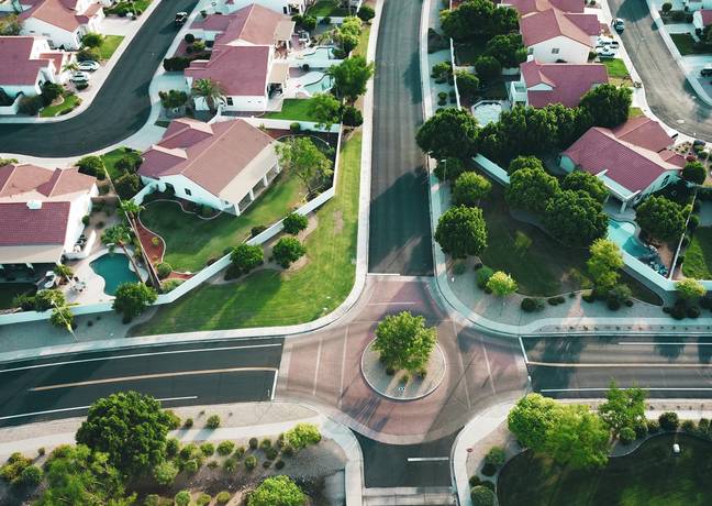 The woman accidentally bought an entire neighbourhood of 85 homes instead of one due to a typo in her paperwork. Credit: Unsplash.