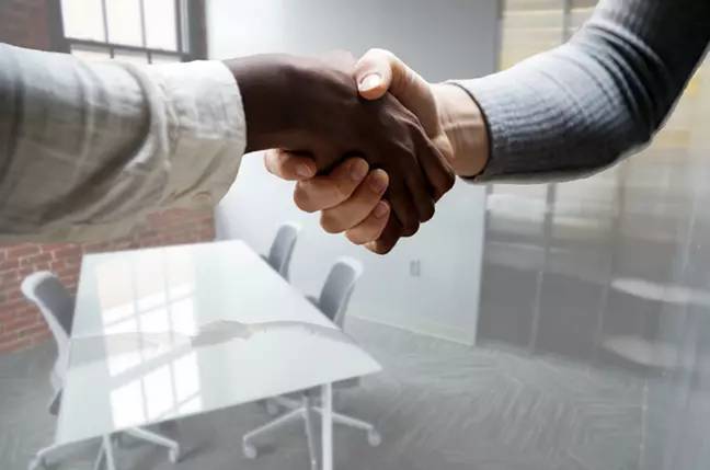 Ask the right question at your interview and you too could enjoy a bland stock photo handshake meant to indicate you've got the job. Credit: Tumisu/Pixabay