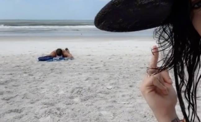 The woman wasn't happy that the sunbather decided to lay 10ft away from her on an empty beach. Credit: @korynnec/ TikTok