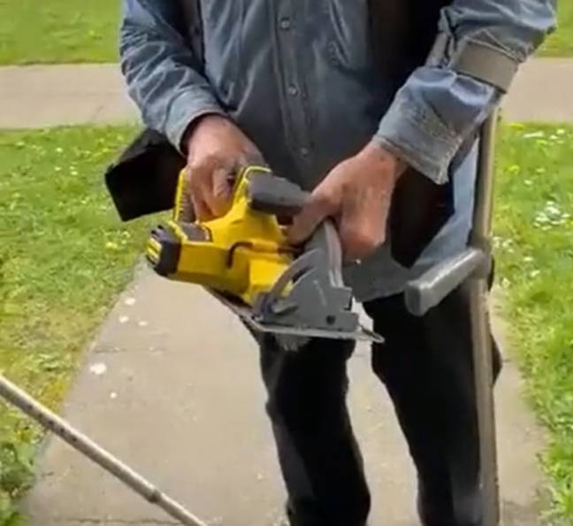 A frightening clip shows a landlord going after a tenant with an electric saw. Credit: Twitter/@LiqaDr