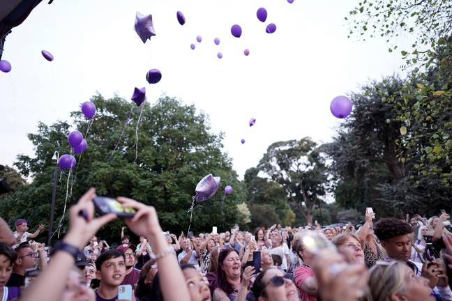 Attendees at the vigil released purple balloons into the sky. Credit: PA Images/Alamy Stock Photo