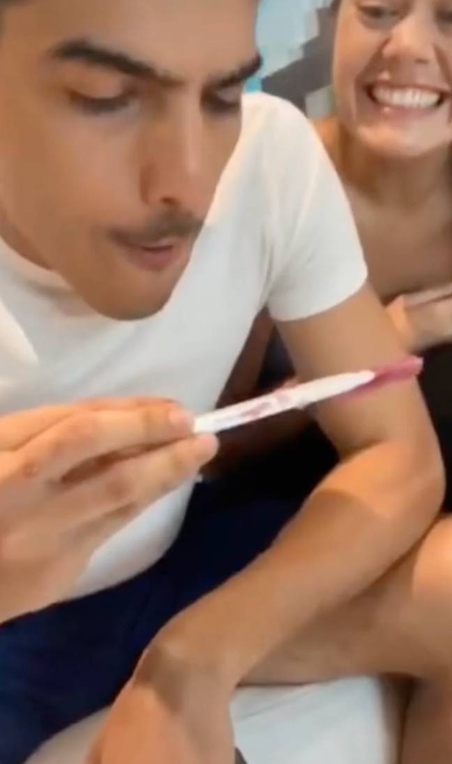 The woman feeds the lolly to her partner. Credit: TikTok/@livingmemerz