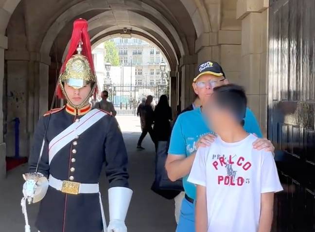 The guard made a sweet gesture. Credit: YouTube /  The Royal King’s Guards England
