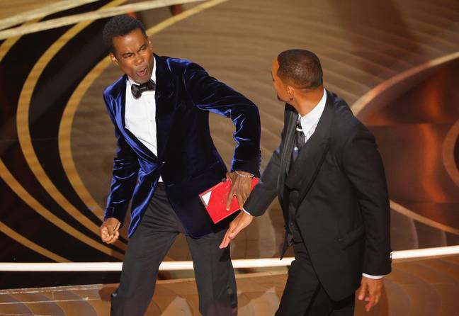 Chris Rock reacts to Will Smith's slap. Credit: Alamy