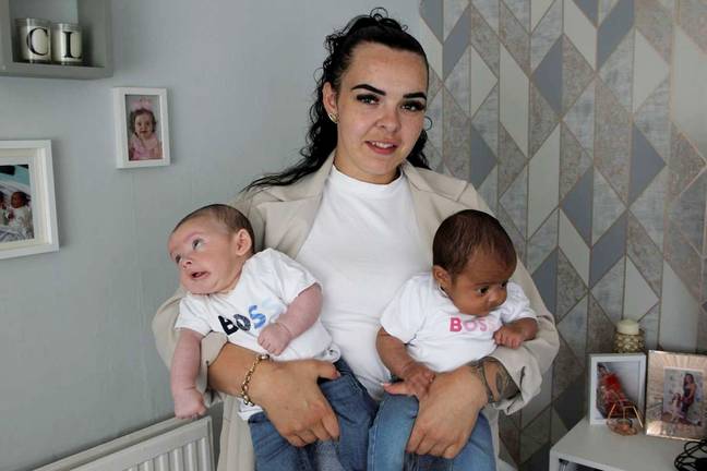 A mum was left gobsmacked when she gave birth to million-to-one black and white twins. Credit: SWNS