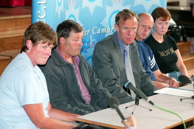 Mr Hankins (centre) at a press conference alongside Holly and Jessica's parents. Credit: Alamy 