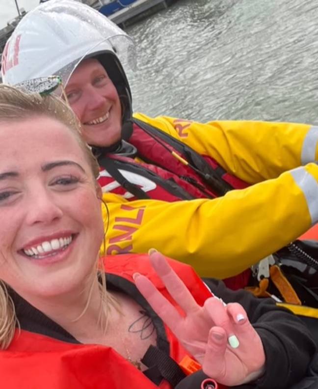 After realising that the rising tide had cut her off the RNLI was able to come and rescue her. Credit: Instagram/@kayla_evelynx 