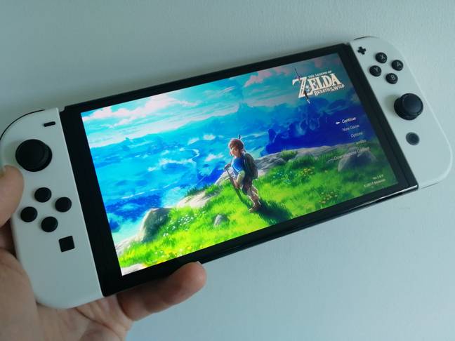 The Nintendo Switch - OLED Model in hand / Credit: the author
