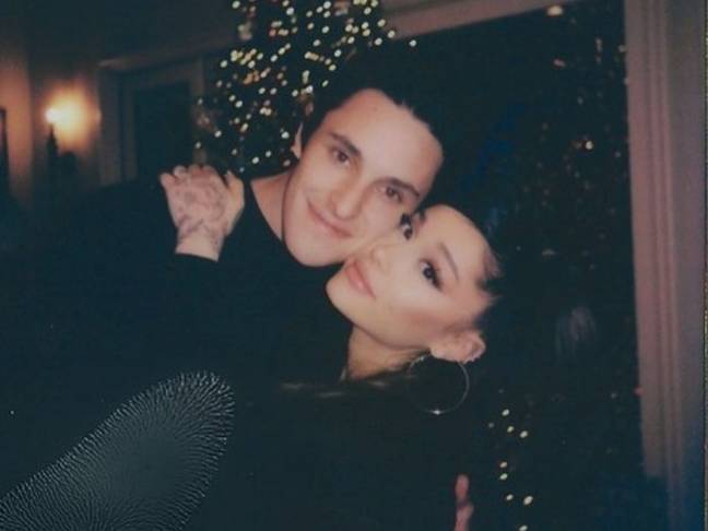 Dalton Gomez and Ariana Grande cuddling up at Christmas ' Credit: Instagram/Ariana Grande