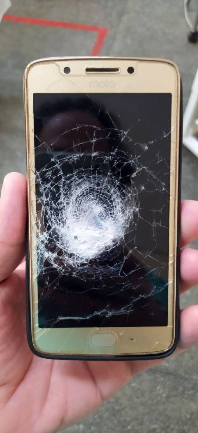 The smartphone took the deadly force of the bullet. Credit: Newsflash