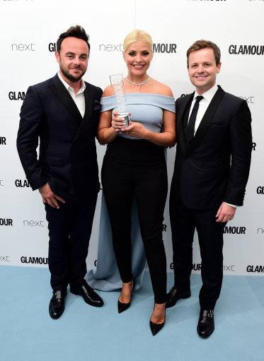 Ant and Dec presented Holly with the TV Personality Award at the Glamour Women of the Year Awards 2016. Credit: PA 