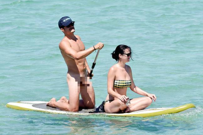 Orlando Bloom was photographed naked on the paddleboard with Katy Perry. Credit: Xposurephotos