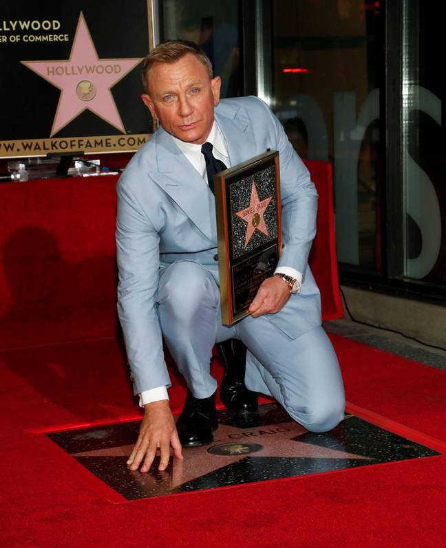 Daniel Craig poses after unveiling his star on the Hollywood Walk of Fame. Credit: REUTERS/Alamy Stock Photo