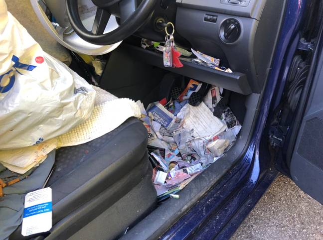 The car was strewn with all kinds of litter and junk. Credit: Hants Road Policing 