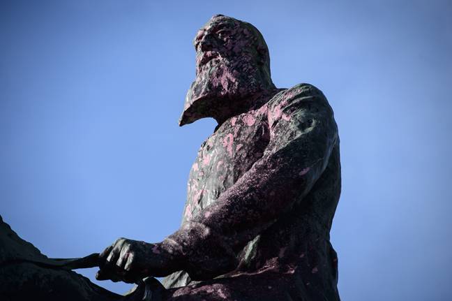 This statue of King Leopold II in Ghent was also splashed with paint. Credit: PA