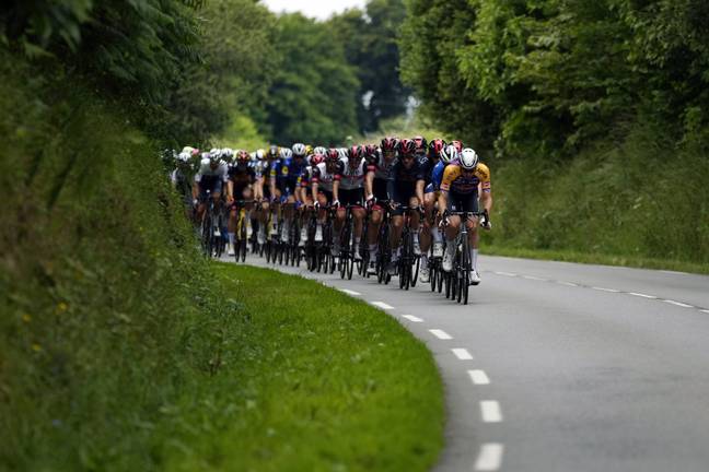The peloton riding Saturday's first stage. Credit: PA