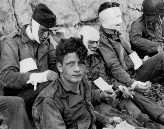 A group of soldiers injured during the landing. Credit: MEDIADRUMIMAGES / NARA