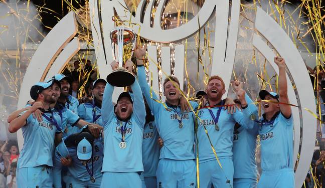England's captain Eoin Morgan lifts the trophy after winning the Cricket World Cup final match. Credit: PA