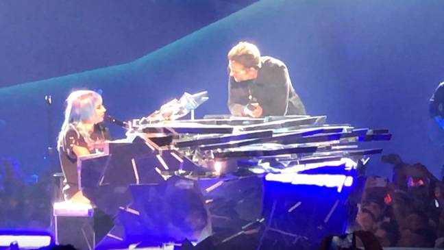 Lady Gaga and Bradley Cooper on stage in Vegas. credit: Youtube/Gaga Daily