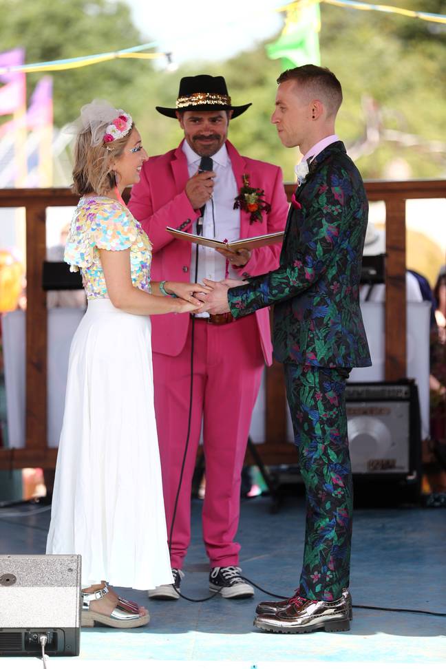 The pair wed in a colourful ceremony at Glasto. Credit: SWNS