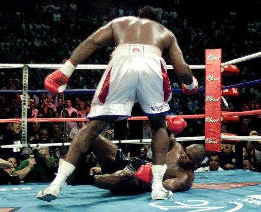 Lennox Lewis knocks out Mike Tyson in the 8th round. Credit: PA