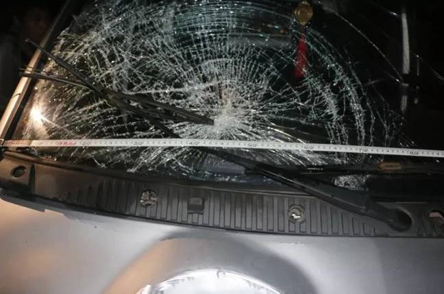 Damage to the car that struck the husband. Credit: AsiaWire