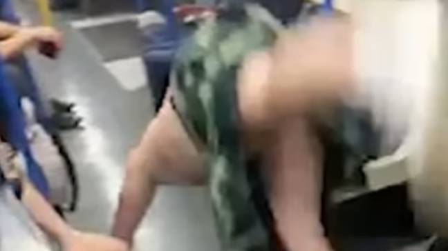 A Scottish passenger reveals all performing the worm on the London Underground.