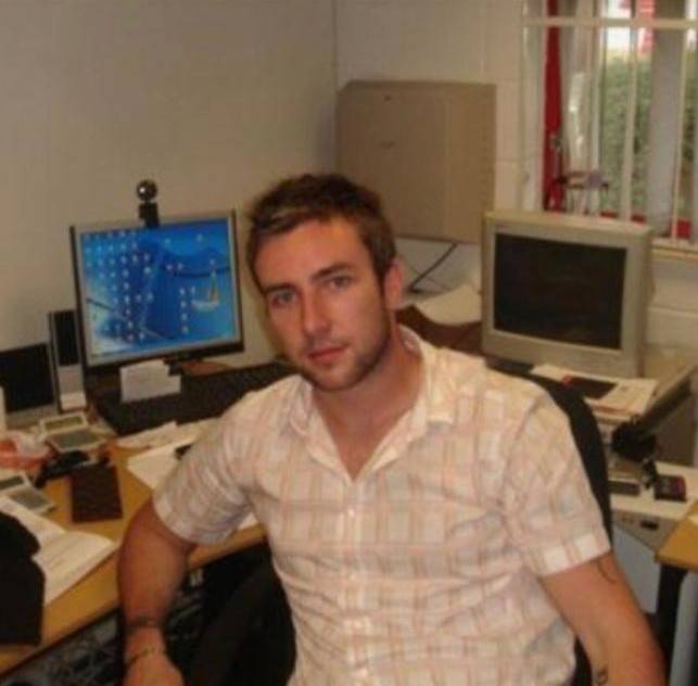 Adam aged 23 in his first office. Credit: Adam Deering