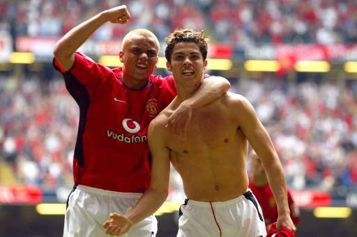 Ronaldo in 2004 with Manchester United teammate Wes Brown. Credit: PA