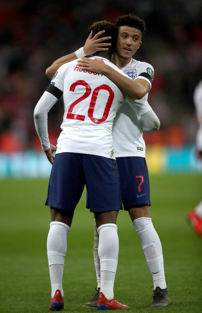 England's Jadon Sancho and Callum Hudson-Odoi embrace after the UEFA Euro 2020 Qualifying against Czech Republic. Image credit: PA