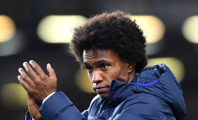 Willian applauds the Chelsea fans but will he be moving to Barcelona at the end of the season. Image: PA Images