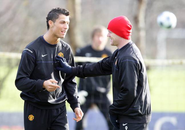 Rooney presumably pushing Ronaldo away because he's annoying. Image: PA Images