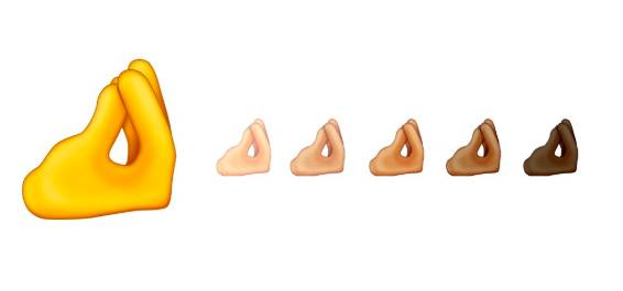The new 'pinching fingers' emoji is going down well online (Credit: Emojipedia)
