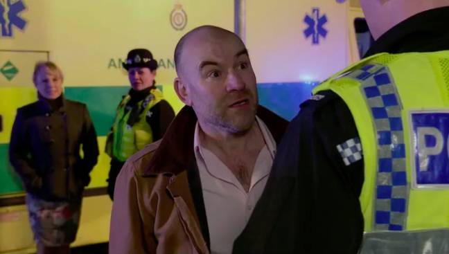 Geoff's son Tim is stopped from entering the house by police (Credit: ITV)