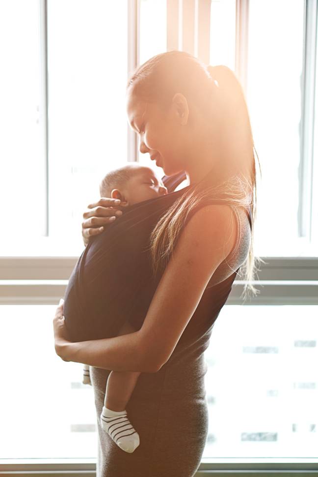 Woman with baby - Unsplash