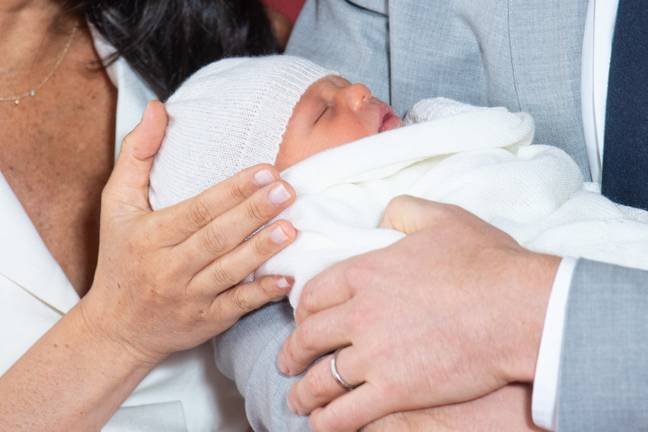 Harry and Meghan present their little boy to the world on Wednesday (Credit: PA)