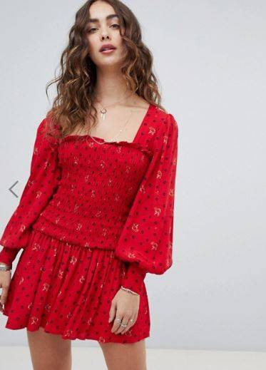 Free People Two Faces ruched waist mini dress was £108 and now £54. Credit: ASOS