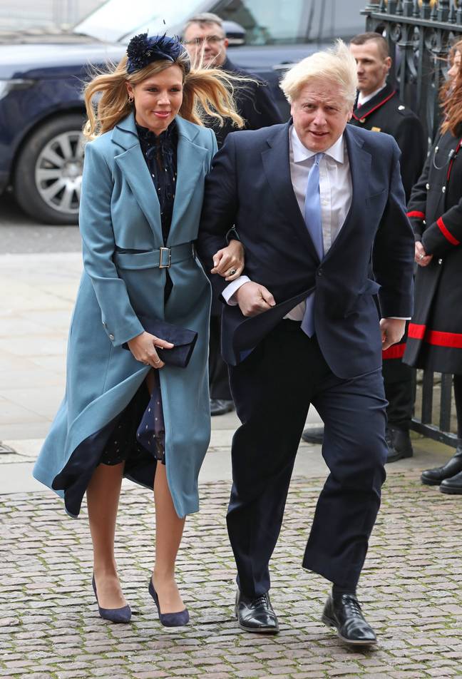 Boris with partner Carrie Symonds, who has welcomed the couple's first child (Credit: PA)