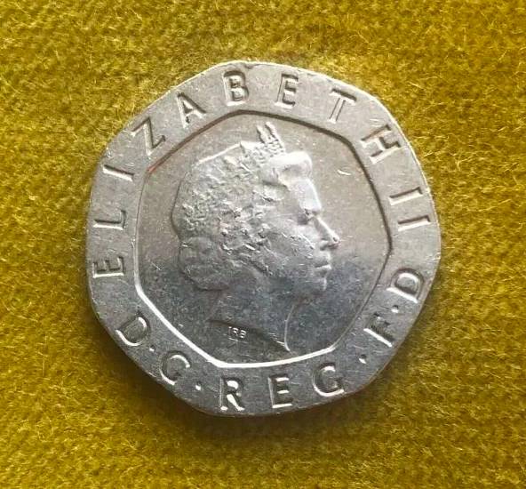 The 20p coin has no date on it (Credit: eBay)