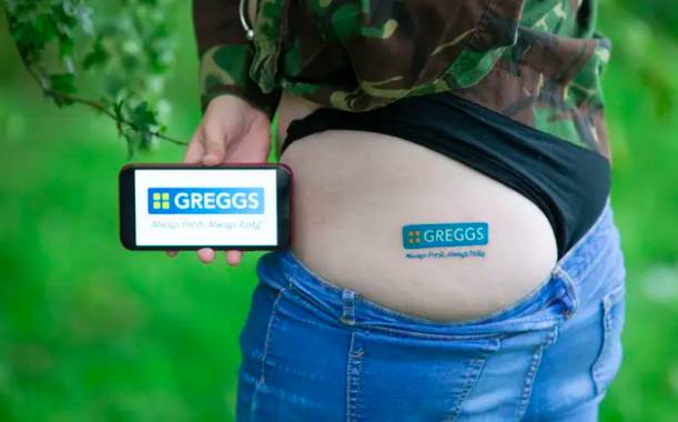 This is the sign of a true Greggs fan (Credit: Caters)