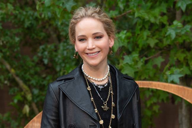 Jennifer Lawrence at the Dior Womenswear show as part of Paris Fashion Week in September. J.Law is said to have work Dior for her wedding, ad her hair in a loose up-do. (Credit: PA)