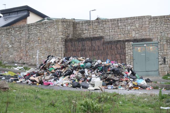 Fly-tipping is the illegal dumping of furniture and rubbish (Credit: PA)