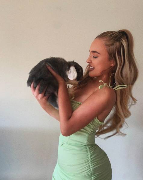 Lucy with her pet bunny, Floppy (Credit: Instagram/luplunkett)