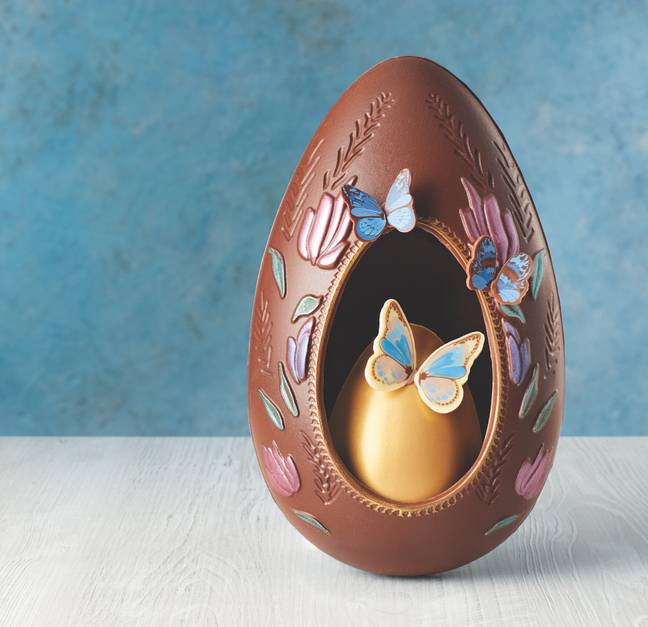 This egg is beautifully hand decorated with butterflies and has a second egg inside (Credit: ALDI)