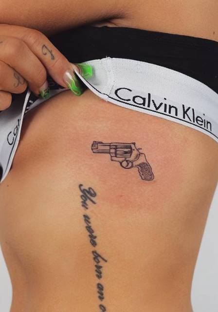 The small ink of a gun is on Jesy's torso. (Credit: Instagram/Jesy Nelson)