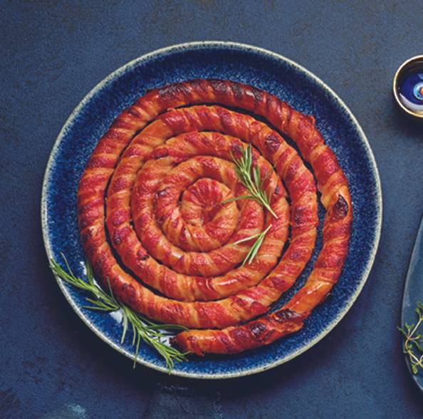The 2m long pig in blanket is a showstopper from the new festive range. Credit: Aldi