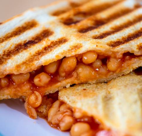 A jaffle is commonly filled with tinned beans or spaghetti Credit: SWNS