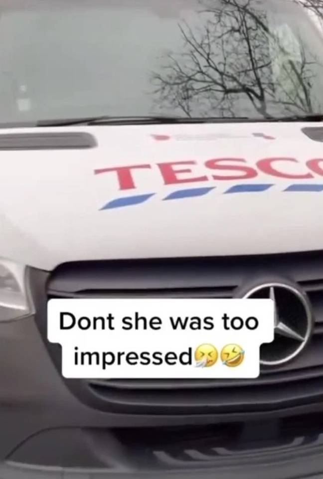 As the camera pans out to reveal the rest of the vehicle - it's actually a Tesco delivery van instead. (Credit: TikTok)