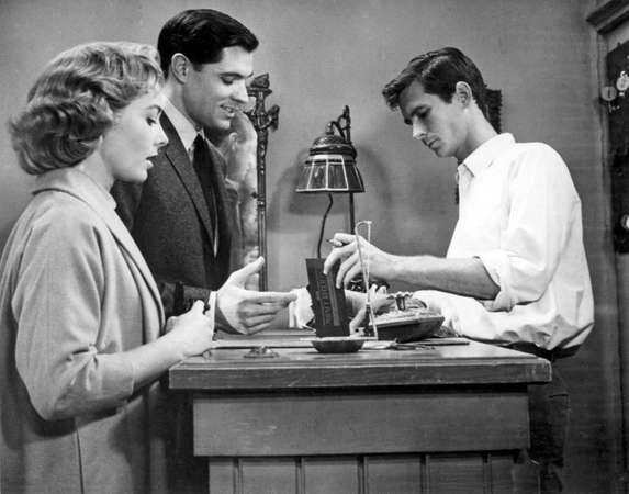 Vera Miles, John Gavin and Anthony Perkins in a scene from Psycho. (Credit: Paramount Pictures)