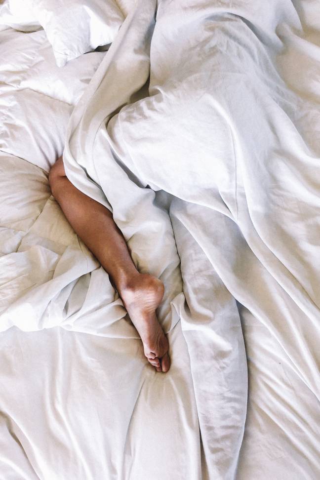 Side sleepers should straddle a pillow (Credit: Unsplash)